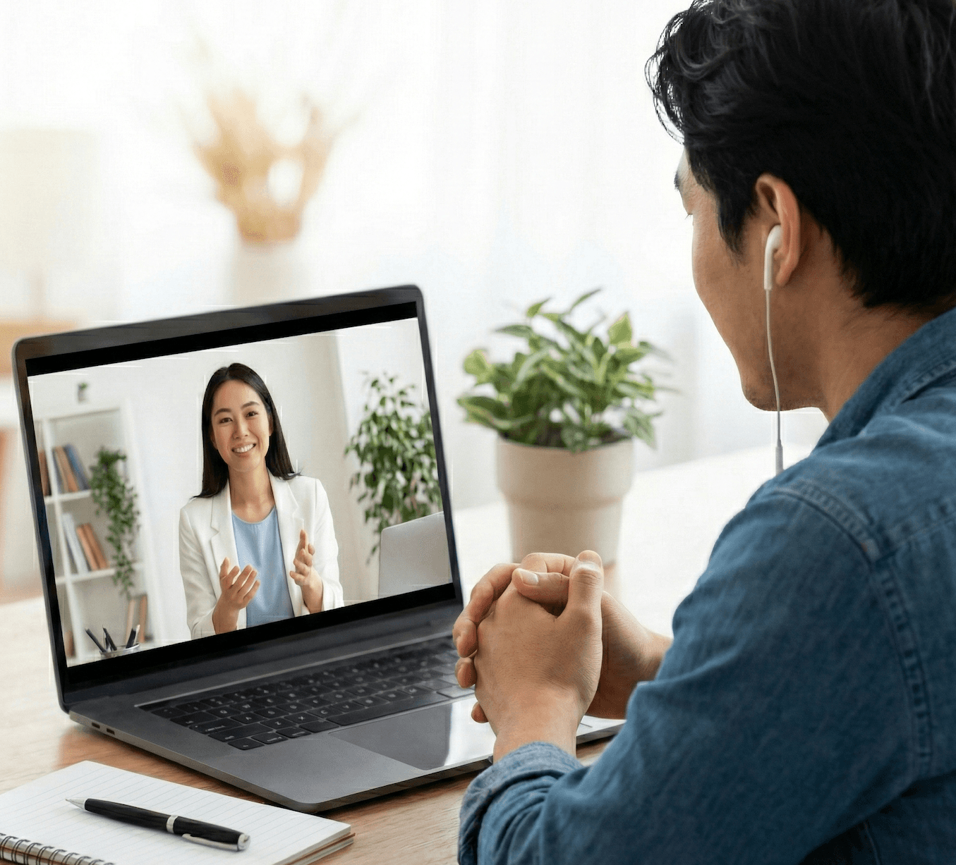 A person attending an online mental health appointment from home